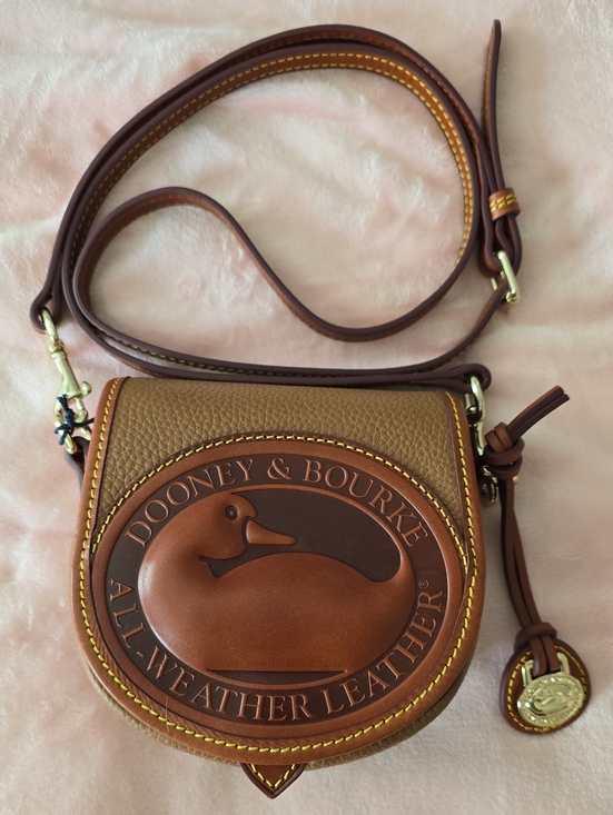 Dooney & Bourke Handbags - Dooney & Bourke Duck Bag In Caramel And Brown All-Weather Leather Crossbody